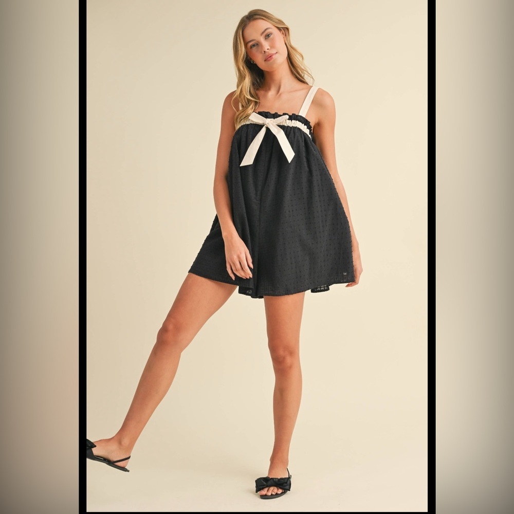 KLESIS RELAXED FIT FLOWY ROMPER WITH FRONT BOW DETAIL